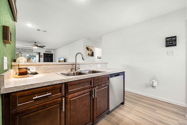 kitchen featuring light wood-type flooring, dark brown cabinets, sink, and dishwasher