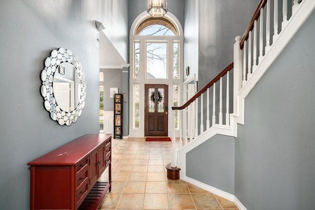 entrance foyer featuring a high ceiling