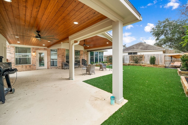 view of patio / terrace with ceiling fan and grilling area