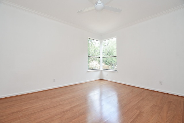 unfurnished room with ornamental molding, ceiling fan, and light hardwood / wood-style flooring