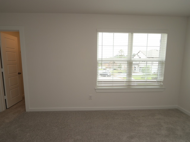 31907 Splendor Dr, Fulshear, TX 77441 - spare room featuring carpet flooring and baseboards