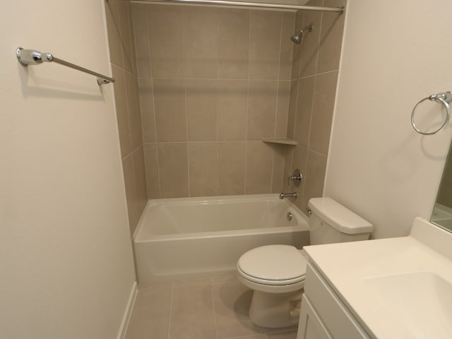 31907 Splendor Dr, Fulshear, TX 77441 - bathroom with toilet, tile patterned flooring, vanity, bathtub / shower combination, and baseboards