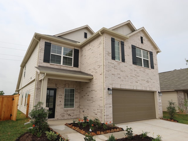31907 Splendor Dr, Fulshear, TX 77441 - traditional-style house featuring an attached garage, concrete driveway, and brick siding