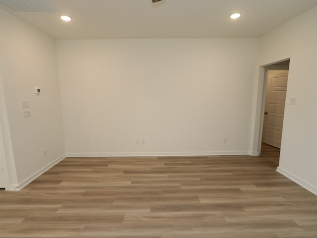 31907 Splendor Dr, Fulshear, TX 77441 - unfurnished room featuring baseboards, recessed lighting, and light wood-style floors