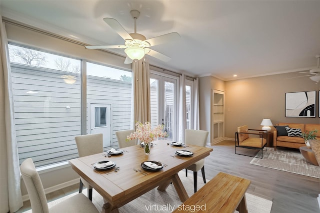 dining room featuring ceiling fan, recessed lighting, baseboards, light wood-style floors, and ornamental molding