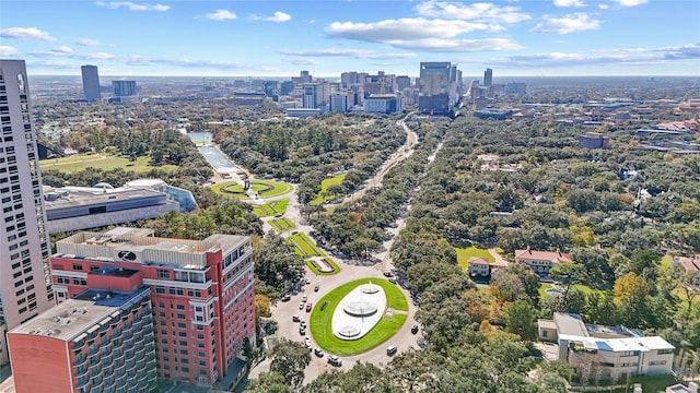 birds eye view of property featuring a city view