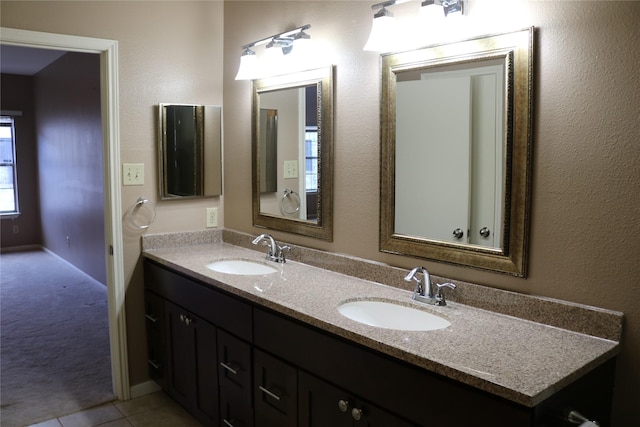 bathroom with vanity and tile patterned floors