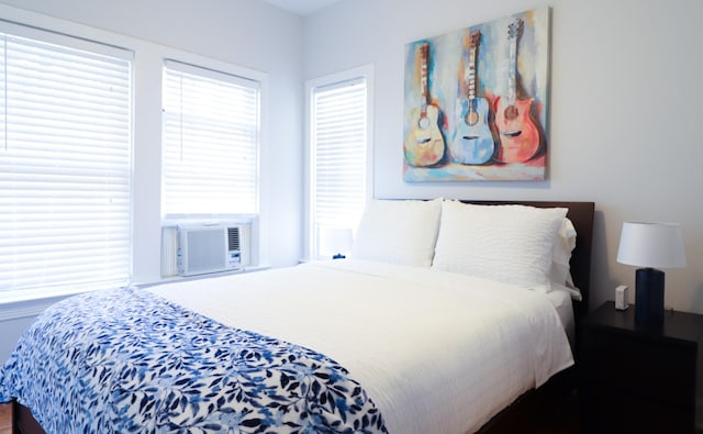 bedroom featuring cooling unit