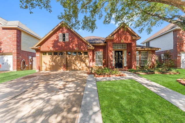 view of front of house with a front lawn and a garage