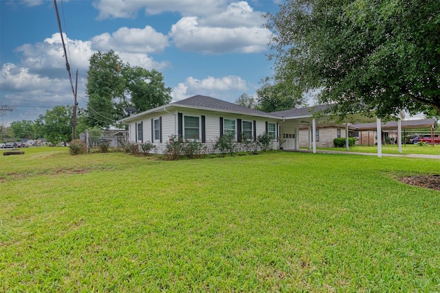 ranch-style home featuring a front lawn and a garage