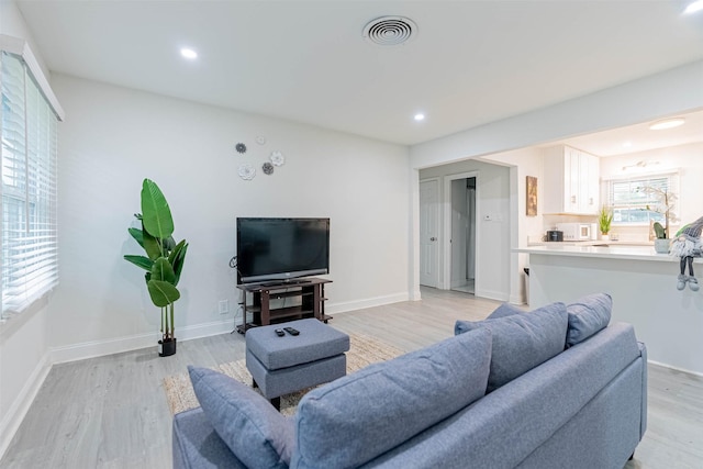 living room with light wood-type flooring