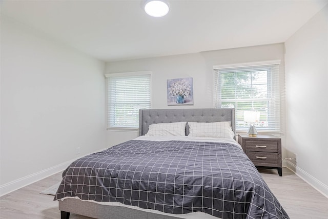 bedroom featuring light wood-type flooring