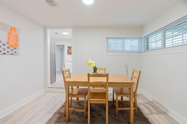 dining area featuring light hardwood / wood-style floors