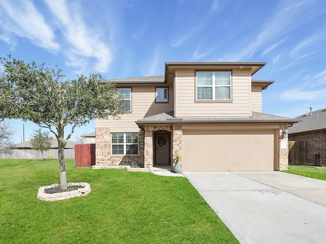 view of front of home with a front yard and a garage