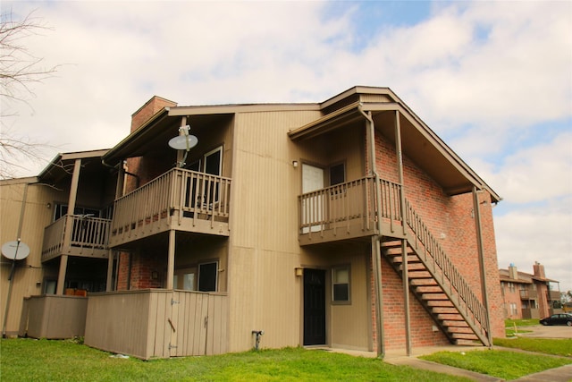 view of property featuring stairs