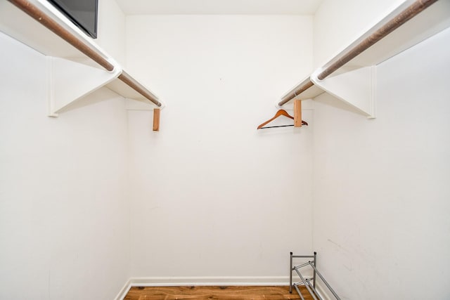 walk in closet featuring wood-type flooring