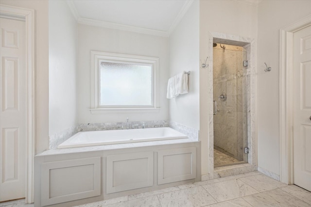 bathroom with ornamental molding and independent shower and bath