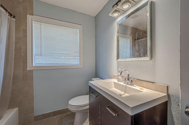 full bathroom featuring toilet, shower / bath combo, tile patterned floors, and vanity