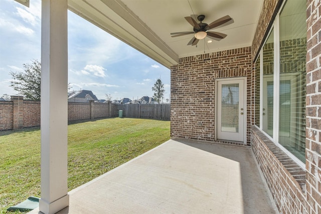 view of patio featuring ceiling fan