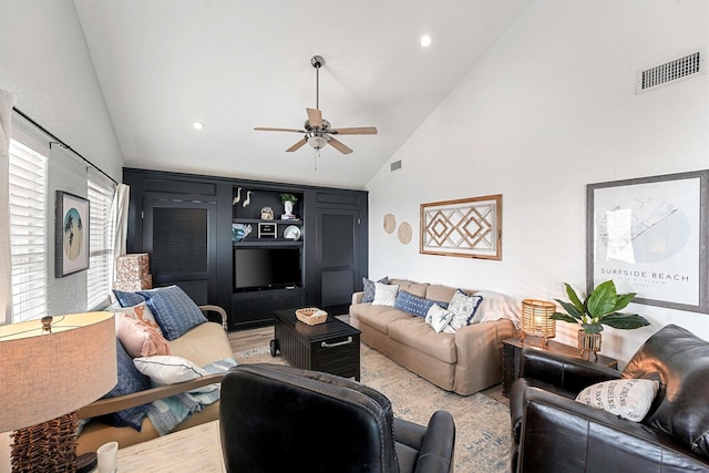 living room with high vaulted ceiling, ceiling fan, and wood-type flooring