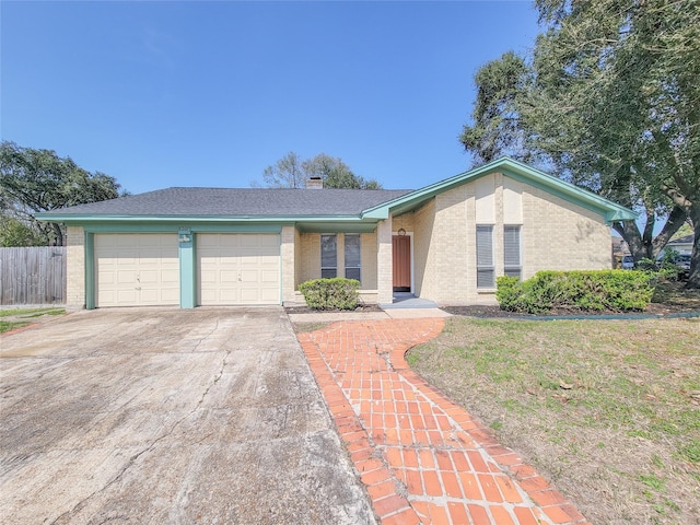 single story home with a garage