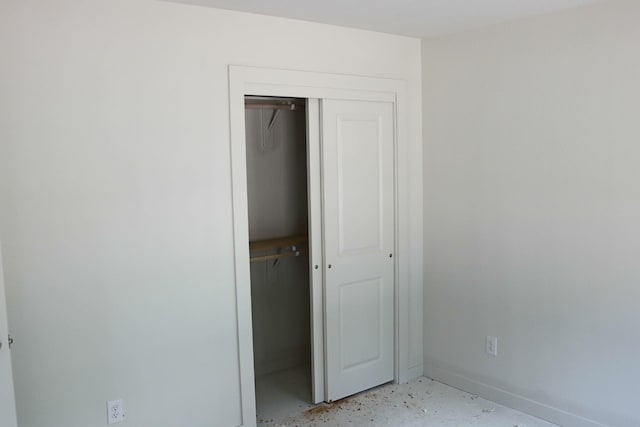 unfurnished bedroom featuring a closet