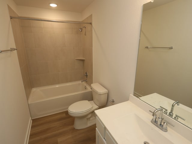 31911 Splendor Dr, Fulshear, TX 77441 - full bathroom with toilet, wood finished floors, shower / washtub combination, recessed lighting, and vanity