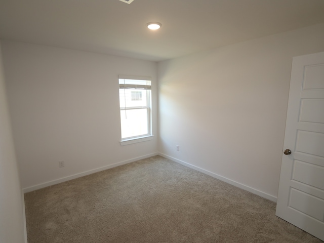 31911 Splendor Dr, Fulshear, TX 77441 - spare room featuring carpet and baseboards