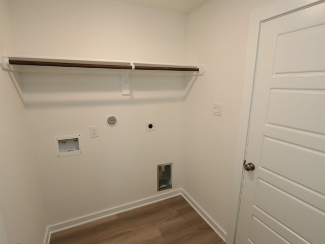 31911 Splendor Dr, Fulshear, TX 77441 - washroom with electric dryer hookup, dark wood-style floors, baseboards, hookup for a washing machine, and hookup for a gas dryer