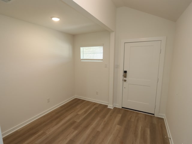 31911 Splendor Dr, Fulshear, TX 77441 - foyer entrance featuring wood finished floors and baseboards