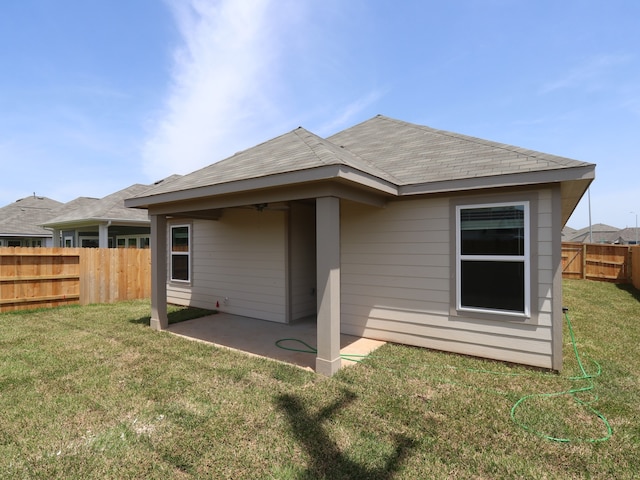 31911 Splendor Dr, Fulshear, TX 77441 - back of property with a patio area and a ceiling fan