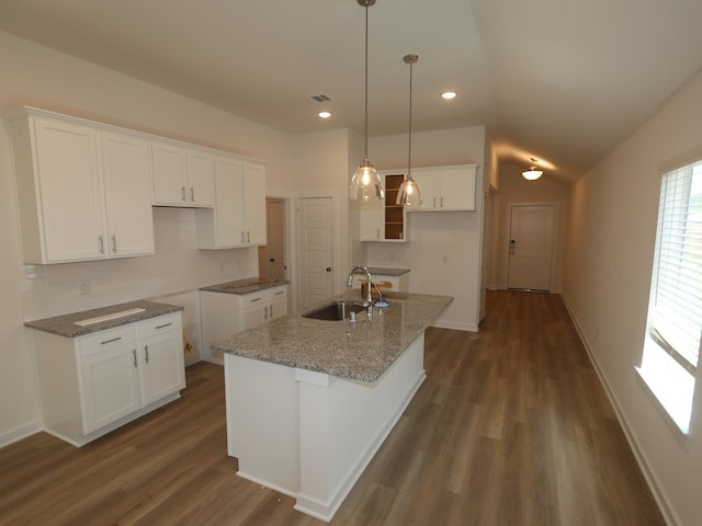31911 Splendor Dr, Fulshear, TX 77441 - kitchen featuring a sink, an island with sink, dark wood finished floors, white cabinetry, and lofted ceiling