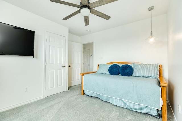 bedroom with carpet and ceiling fan