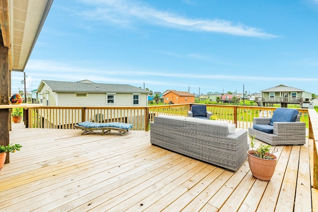 wooden terrace with outdoor lounge area