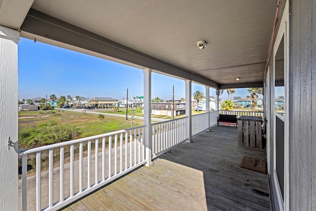 1623 Bay Meadows St, Galveston, TX 77554 - wooden deck with a residential view