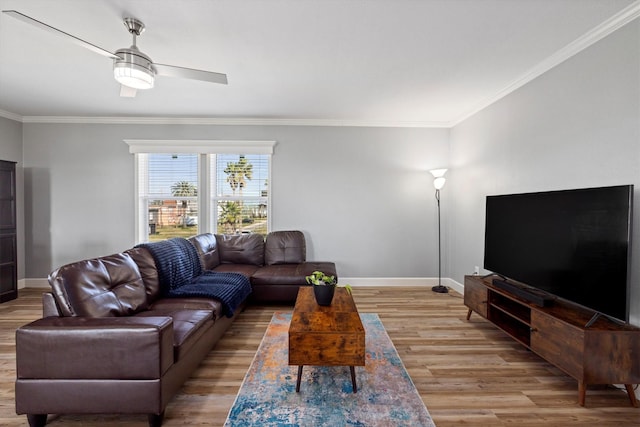 1623 Bay Meadows St, Galveston, TX 77554 - living area featuring light wood-style flooring, crown molding, baseboards, and ceiling fan