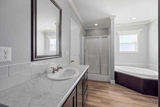 1623 Bay Meadows St, Galveston, TX 77554 - full bathroom featuring a shower stall, a healthy amount of sunlight, wood finished floors, and ornamental molding