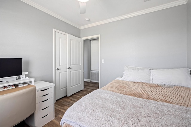 1623 Bay Meadows St, Galveston, TX 77554 - bedroom with dark wood-style floors, visible vents, ceiling fan, a closet, and crown molding