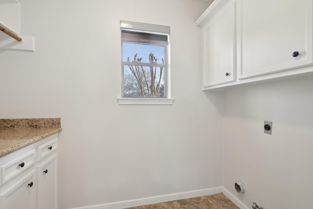 laundry area featuring cabinets and hookup for an electric dryer