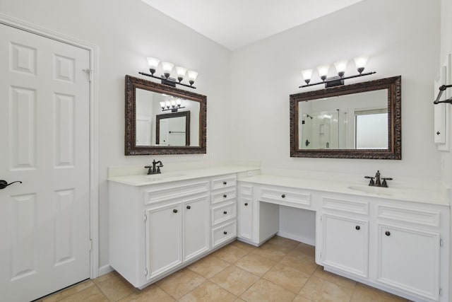 bathroom with tile patterned flooring and vanity