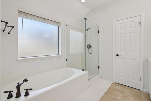 bathroom featuring shower with separate bathtub and tile patterned flooring