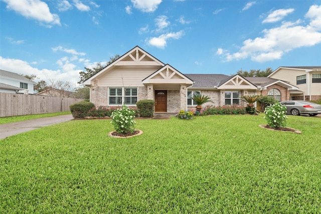 view of front of home with a front lawn