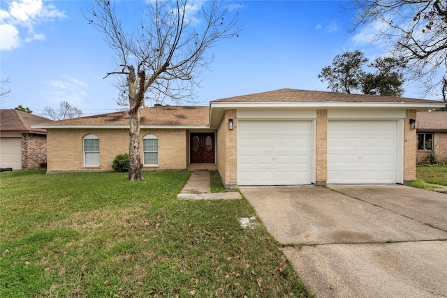 ranch-style house with a front lawn and a garage