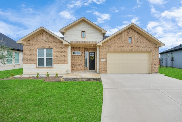 view of front of property with a front yard and a garage