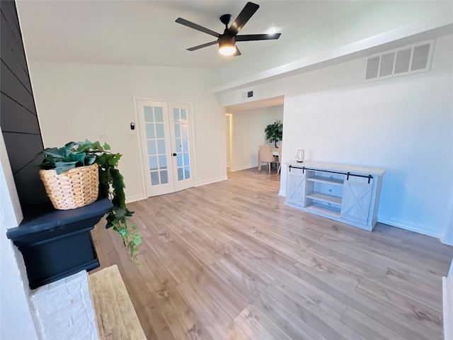 2110 Wilcrest Dr Unit 235, Houston, TX 77042 - living area featuring baseboards, french doors, light wood-style floors, visible vents, and ceiling fan