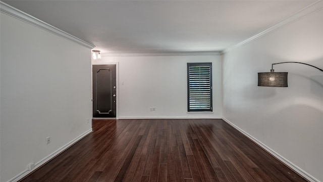 unfurnished room with dark wood-type flooring and crown molding