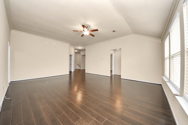 unfurnished room featuring crown molding, lofted ceiling, dark wood-type flooring, and ceiling fan