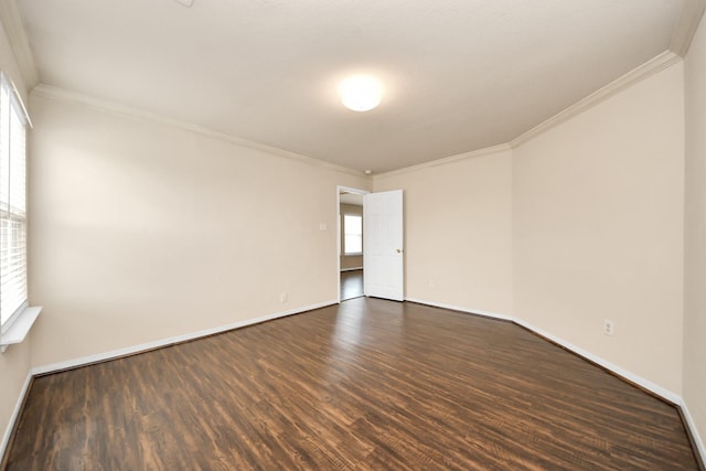 unfurnished room with crown molding and dark hardwood / wood-style flooring