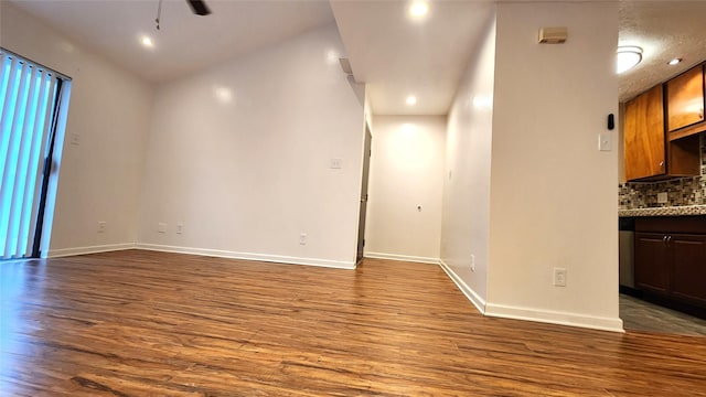 spare room with ceiling fan and hardwood / wood-style floors