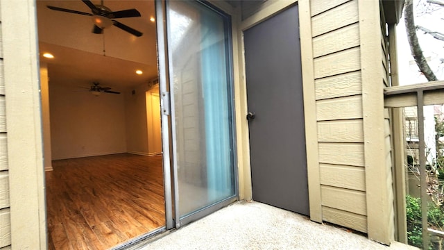 entrance to property with a balcony